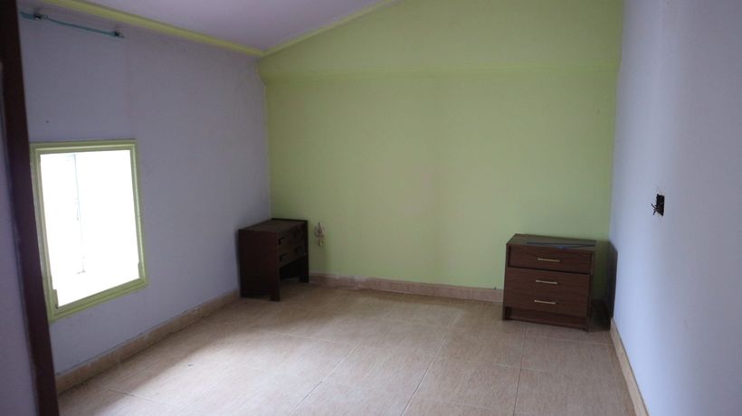 Dormitorio de la vivienda de Unicaja